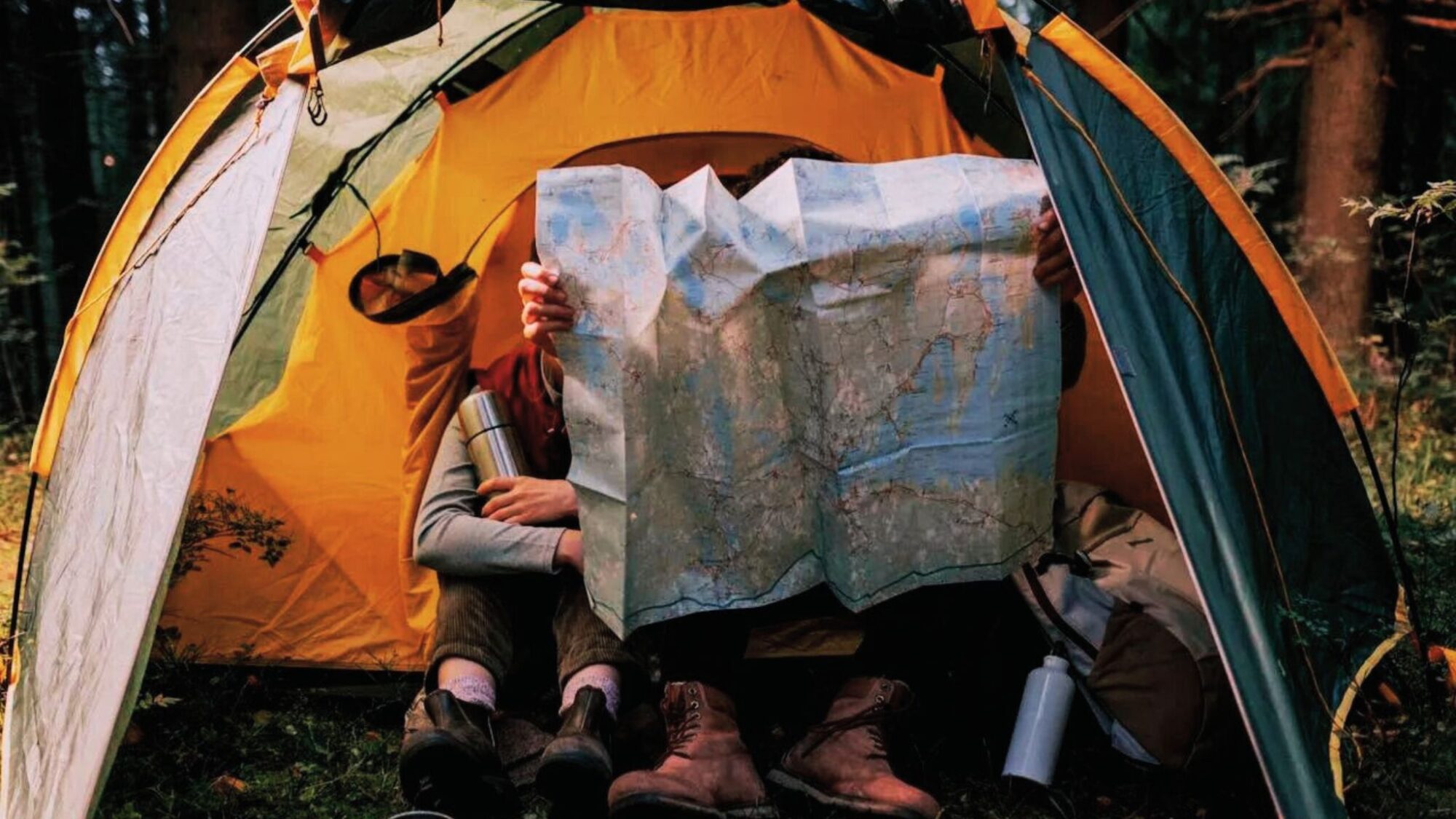 Reading a map while camping